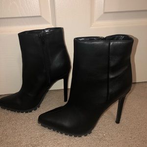 Black skinny heeled boots